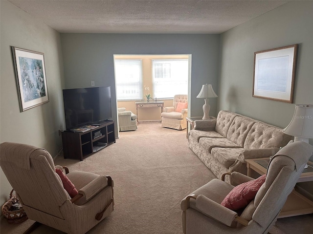 611 Gulf Dr N Unit D24, Bradenton Beach, FL 34217 - carpeted living area with a textured ceiling