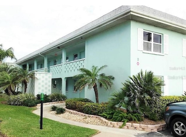 view of home's exterior featuring a yard