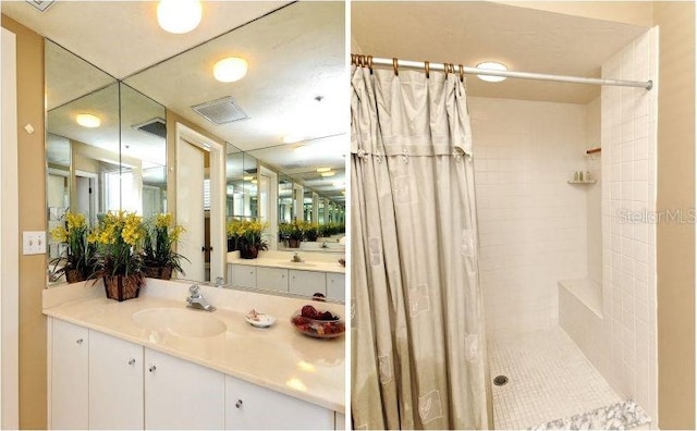 bathroom featuring a shower with shower curtain and vanity