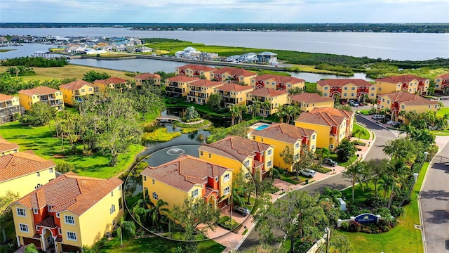 bird's eye view with a water view