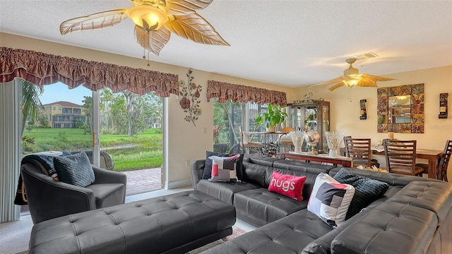 living room featuring a textured ceiling