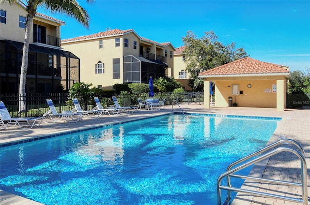 view of pool featuring a patio area