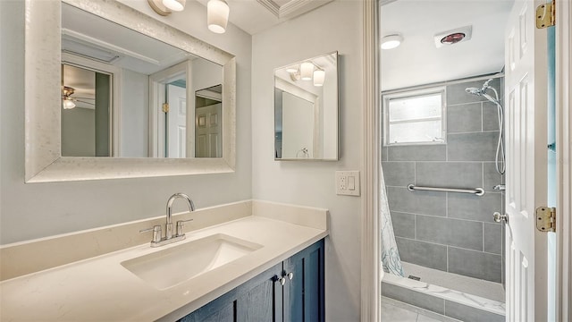 bathroom with tile patterned flooring, vanity, curtained shower, and ceiling fan