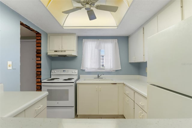 kitchen featuring white appliances, sink, and ceiling fan