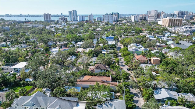 drone / aerial view with a water view