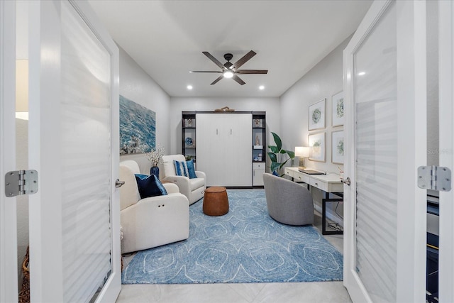 interior space featuring ceiling fan