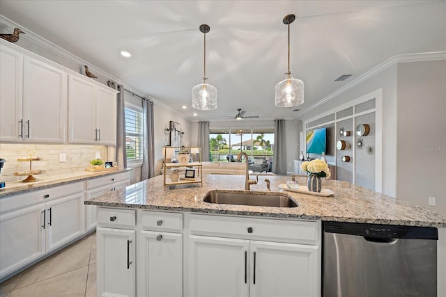 2520 Avolet Ct, Bradenton, FL 34211 - kitchen with stainless steel dishwasher, a sink, ornamental molding, backsplash, and white cabinets