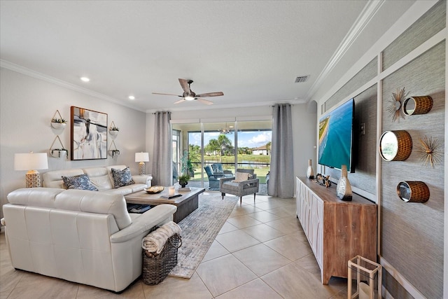 2520 Avolet Ct, Bradenton, FL 34211 - living room with crown molding, a ceiling fan, light tile patterned floors, and recessed lighting