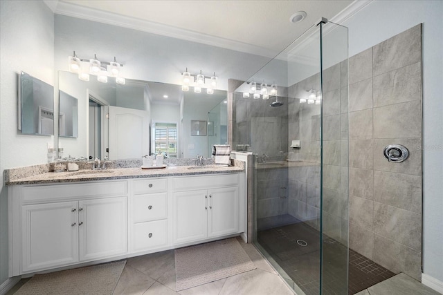 bathroom featuring a tile shower, tile patterned floors, vanity, and ornamental molding