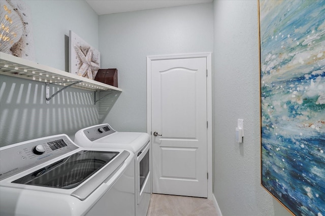 laundry area featuring separate washer and dryer