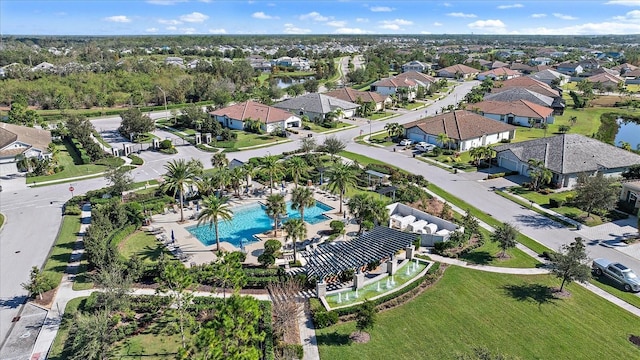 2520 Avolet Ct, Bradenton, FL 34211 - aerial view of property and surrounding area with a pool, nearby suburban area, and a large body of water