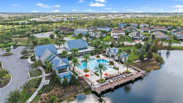 birds eye view of property featuring a water view