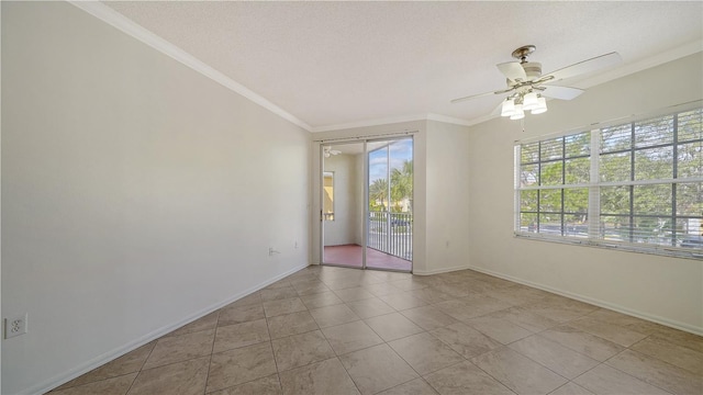 tiled empty room featuring ceiling fan, a textured ceiling, and ornamental molding