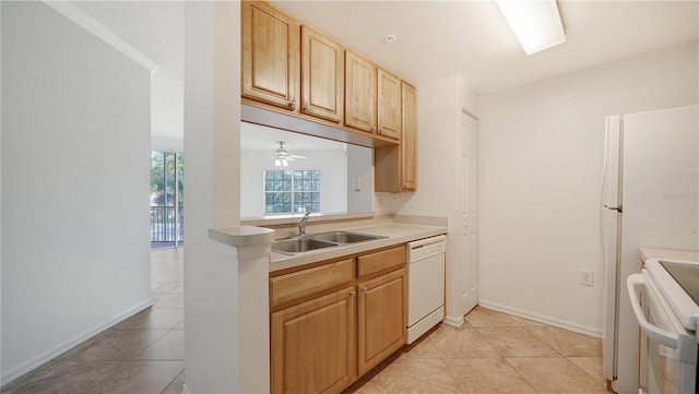 kitchen with ceiling fan, sink, light tile patterned floors, and white appliances