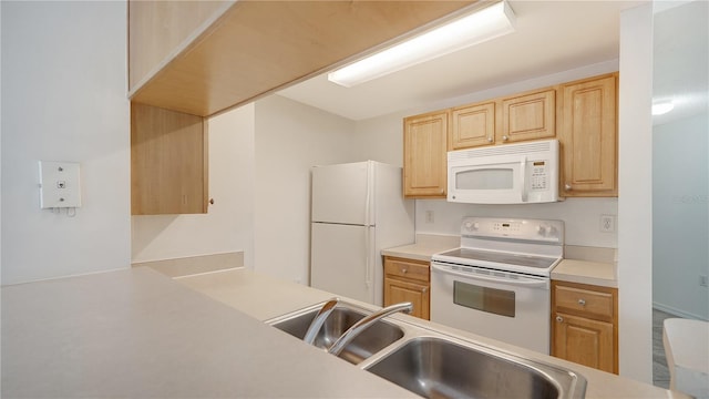 kitchen featuring sink, white appliances, and light brown cabinets