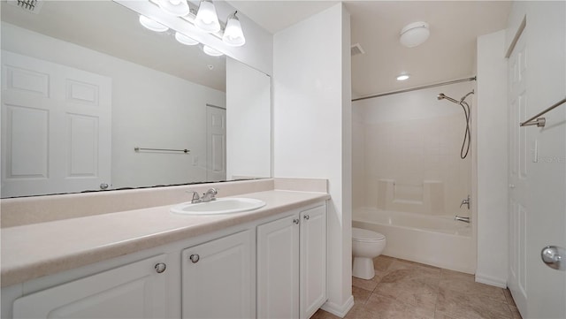 full bathroom with tile patterned flooring, vanity, toilet, and  shower combination