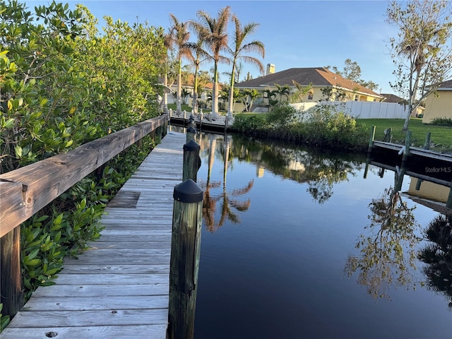 dock area featuring a water view