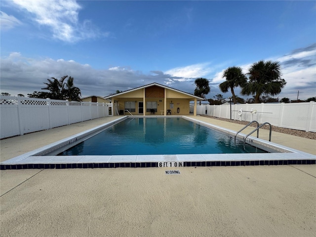 view of pool with a patio area