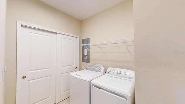 laundry area with separate washer and dryer