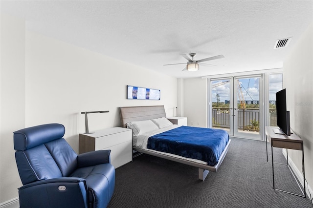 bedroom with carpet, ceiling fan, a textured ceiling, and access to outside