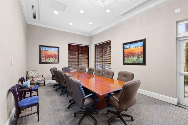 home office featuring carpet, ornamental molding, and a healthy amount of sunlight