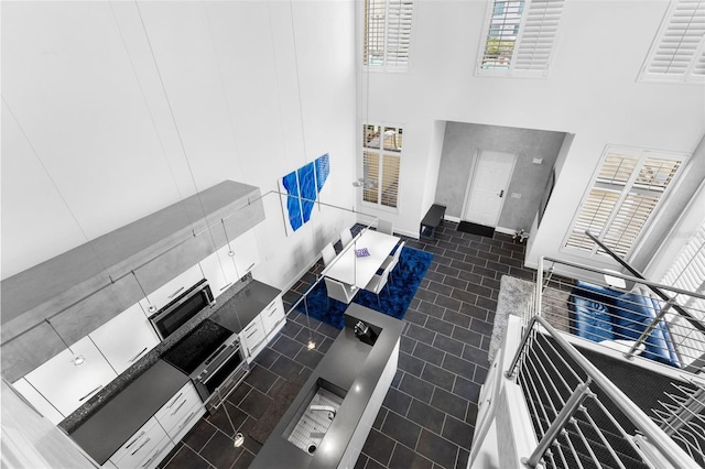 interior space with dark tile patterned floors