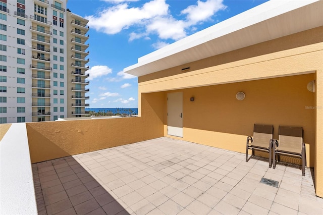 view of patio with a balcony