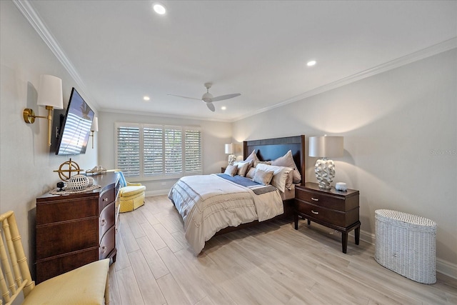 bedroom with light hardwood / wood-style flooring, ornamental molding, and ceiling fan