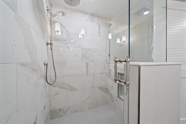 bathroom featuring an enclosed shower