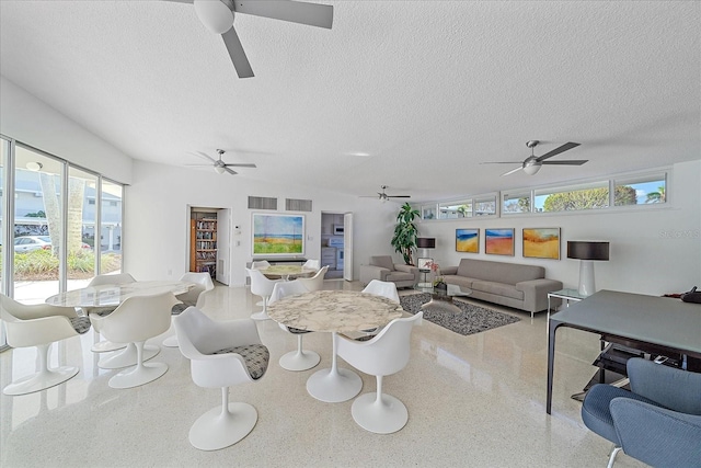 living room with a textured ceiling