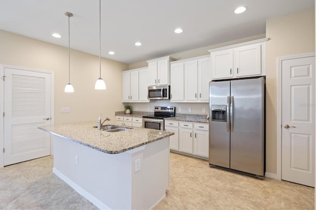 kitchen with appliances with stainless steel finishes, white cabinetry, and sink