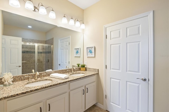 bathroom featuring vanity and walk in shower