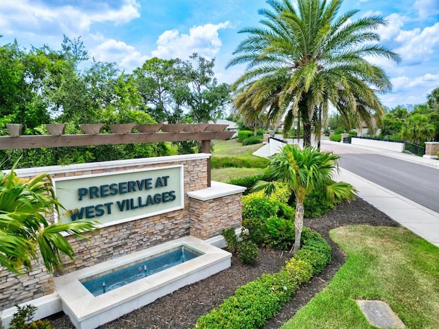 view of community sign