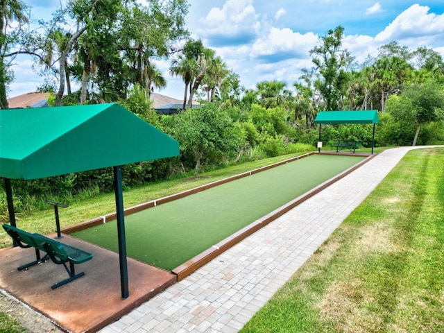 view of home's community featuring a lawn