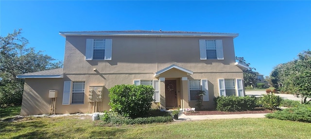 view of front facade with a front lawn