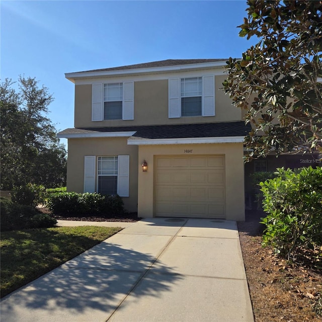 view of front property with a garage