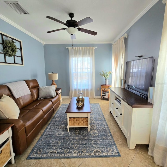 tiled living room with ornamental molding and ceiling fan