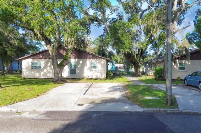 view of home's exterior with a yard