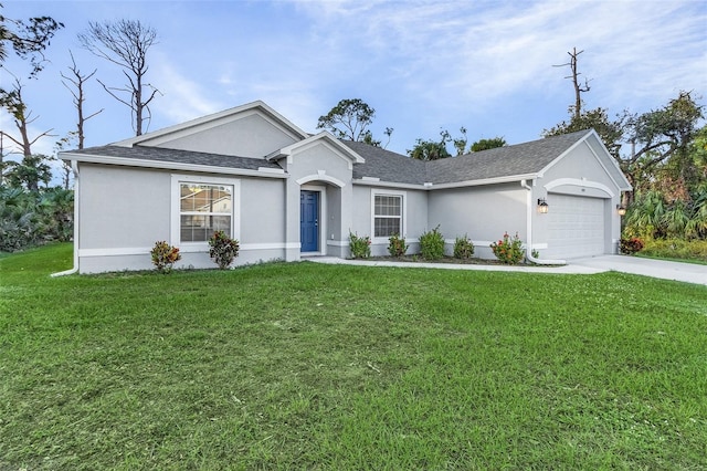 single story home featuring a garage and a front lawn