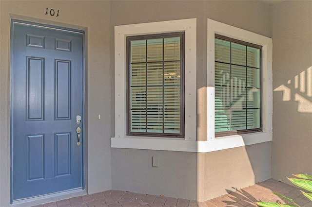 property entrance featuring covered porch