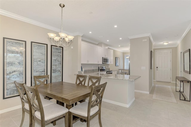 tiled dining area with ornamental molding and a chandelier