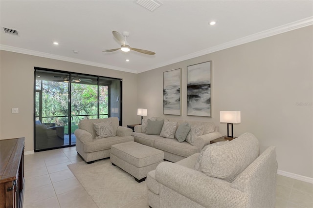 tiled living room featuring ceiling fan and crown molding