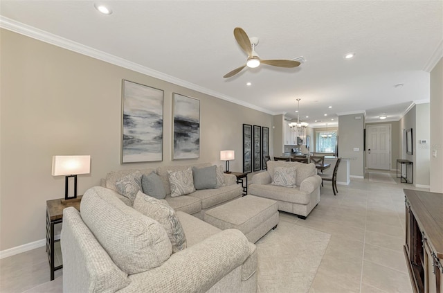 living room featuring ceiling fan with notable chandelier, ornamental molding, and light tile patterned floors