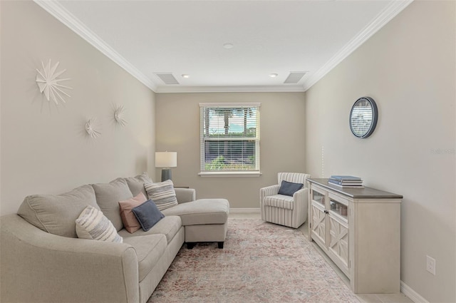 living room featuring crown molding