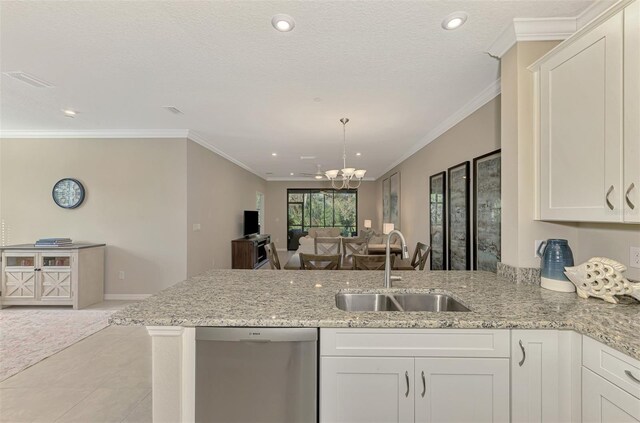 kitchen featuring dishwasher, sink, a chandelier, white cabinets, and ornamental molding