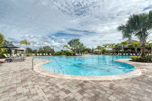 view of pool featuring a gazebo and a patio