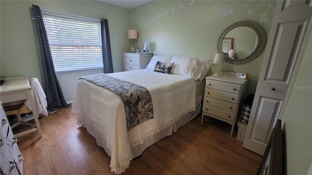 bedroom with wood-type flooring