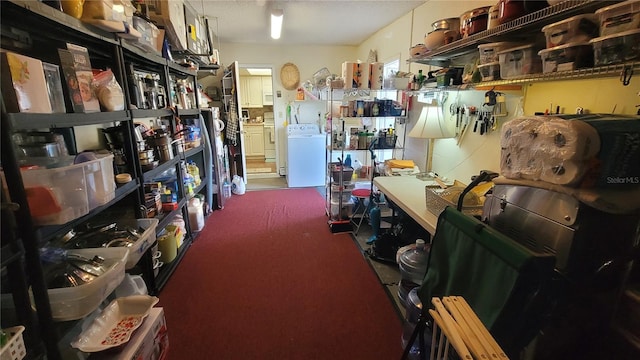 storage room with washer / clothes dryer