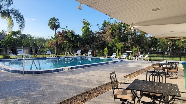 view of swimming pool featuring a patio