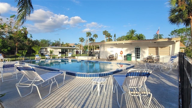 view of pool featuring a patio